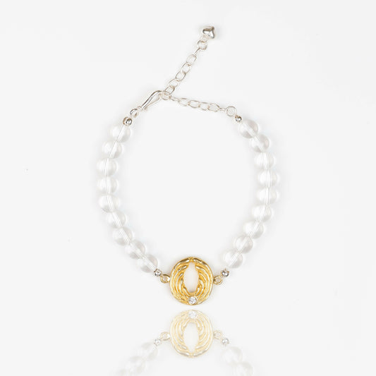Bergkristall-Armband mit Engel – Gold.
